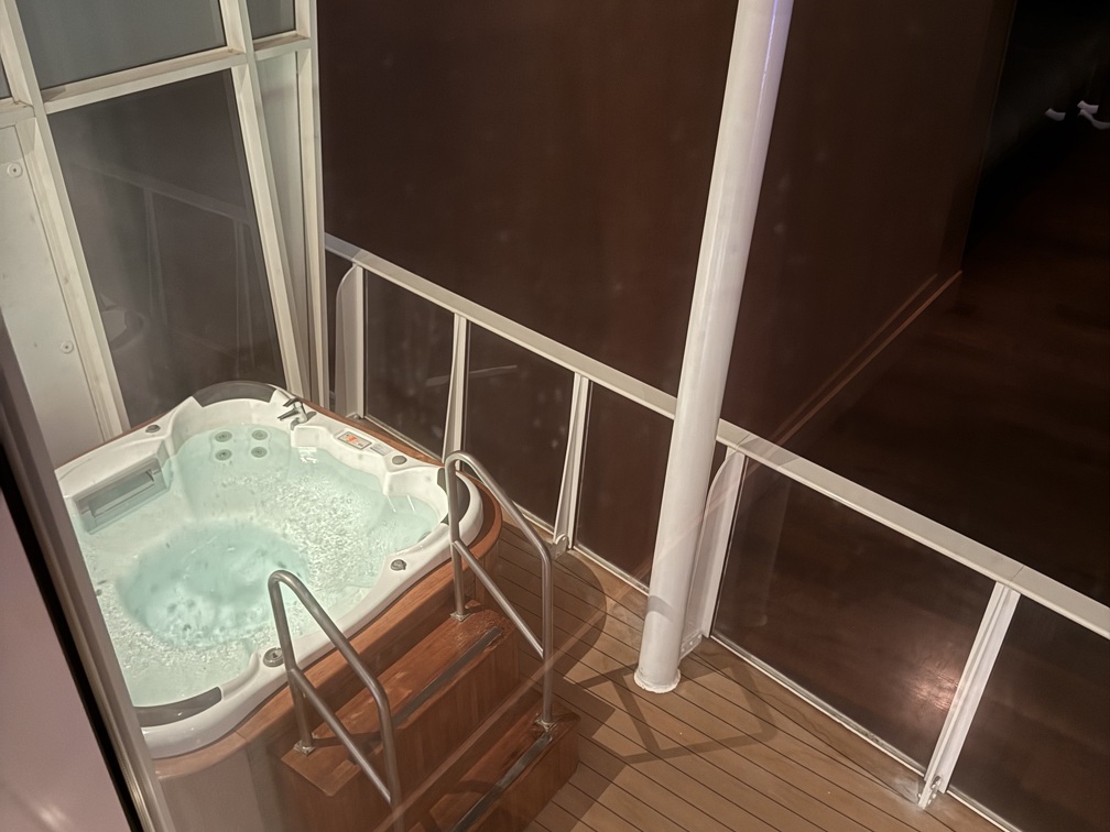 View of balcony hot tub from upstairs landing
